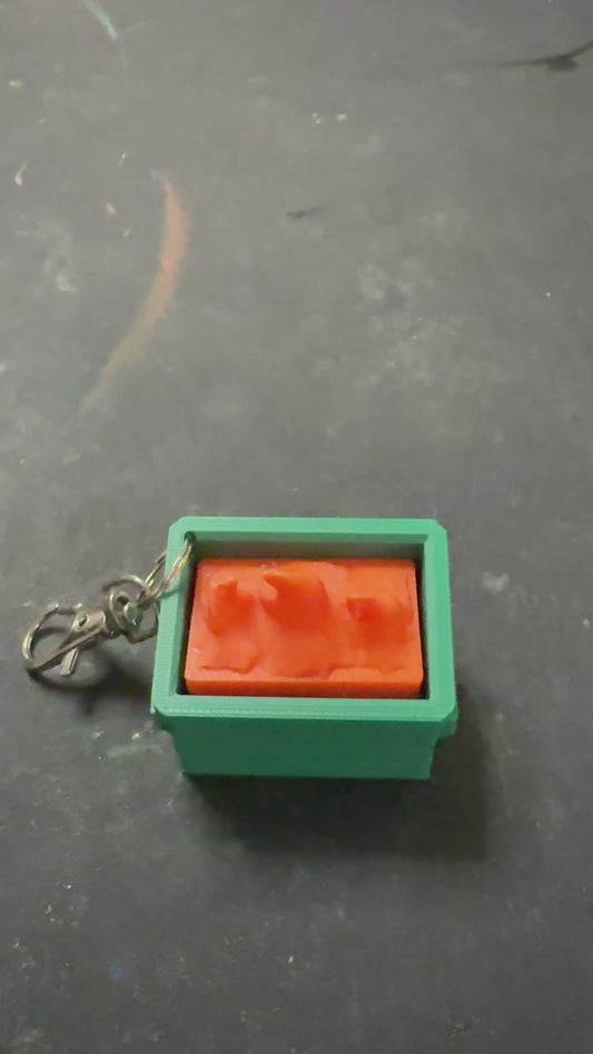 Dumpster Fire Clicker keychain