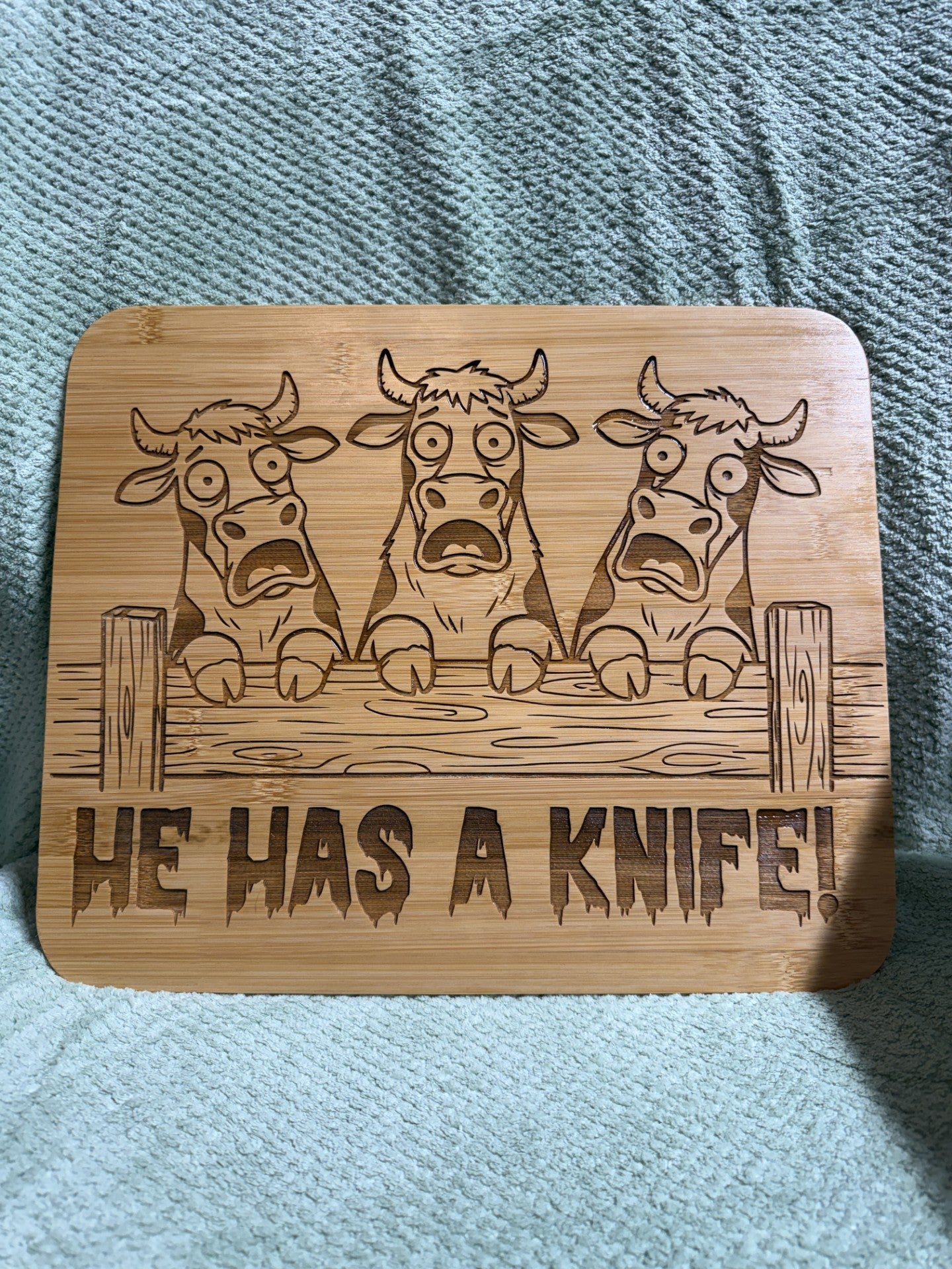 He has a knife cutting board