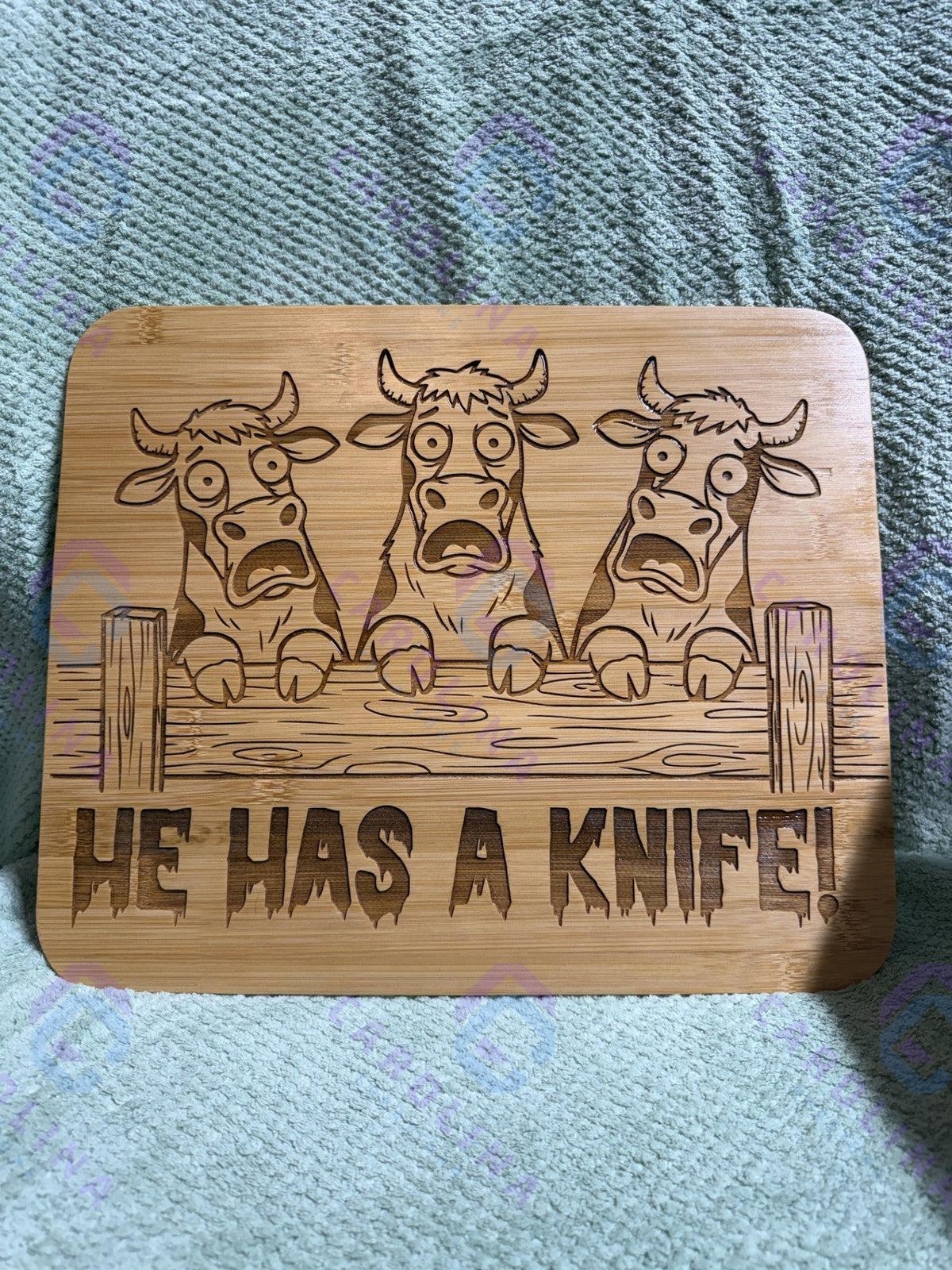 He has a knife cutting board